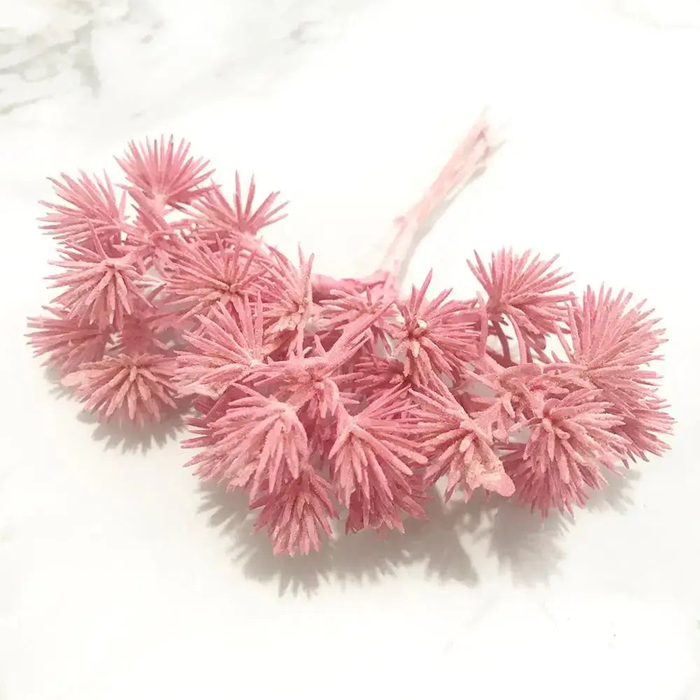 Pink artificial flower cluster with spiky petals and central stem in 200pcs mixed rose red flower stamen bundle for decor