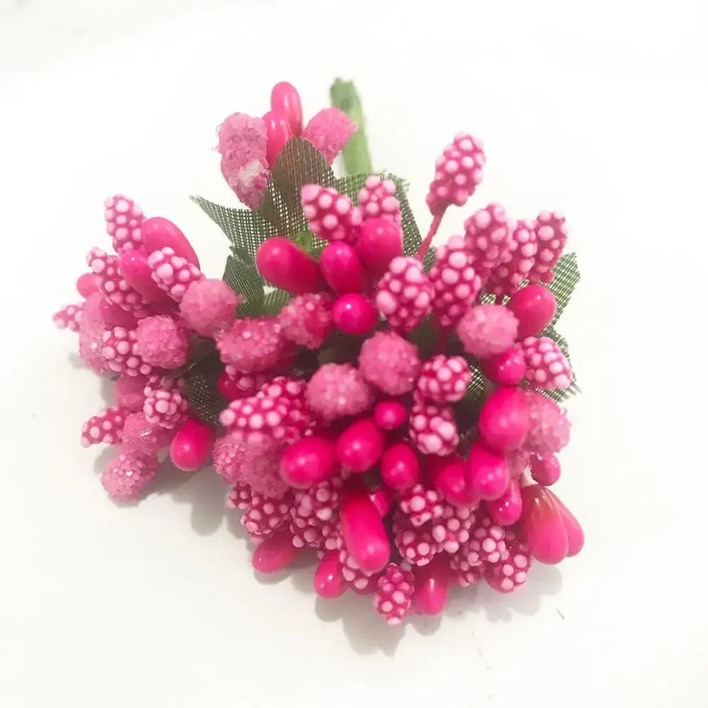 A vibrant pink artificial flower cluster with glossy petals and green mesh leaves from a 200pcs mixed rose red bundle