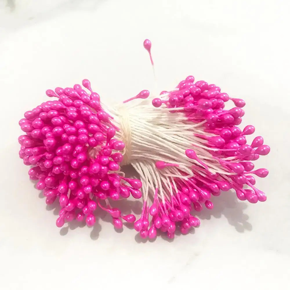 A bundle of 200pcs mixed rose red artificial flower stamen buds with white stems for bedroom diy decor