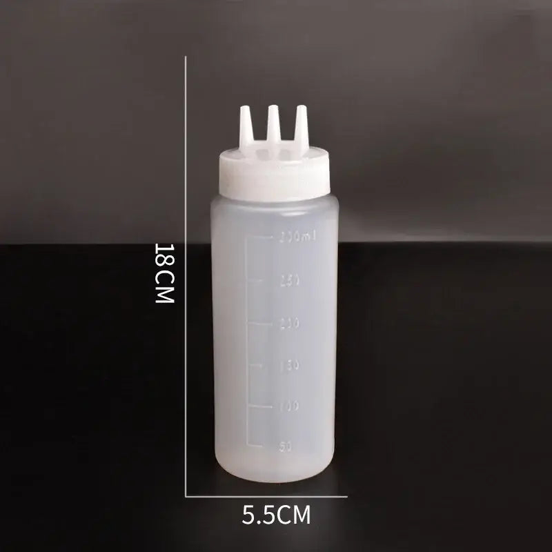 Translucent plastic squeeze bottle condiment dispenser with white cap and three nozzles for multi-color kitchen use