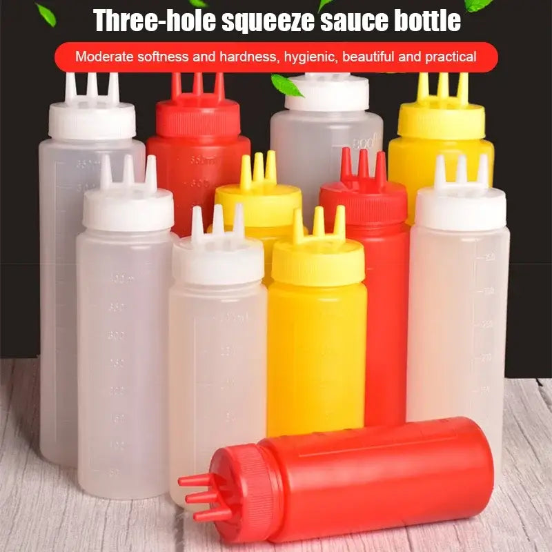 Red plastic three-hole squeeze bottle condiment dispenser with ridged cap and multiple nozzles for kitchen use