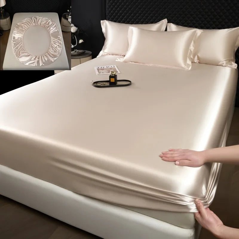 Cream-colored 3 pcs mulberry silk sheet set featuring a smooth satin fitted sheet with elasticized edges