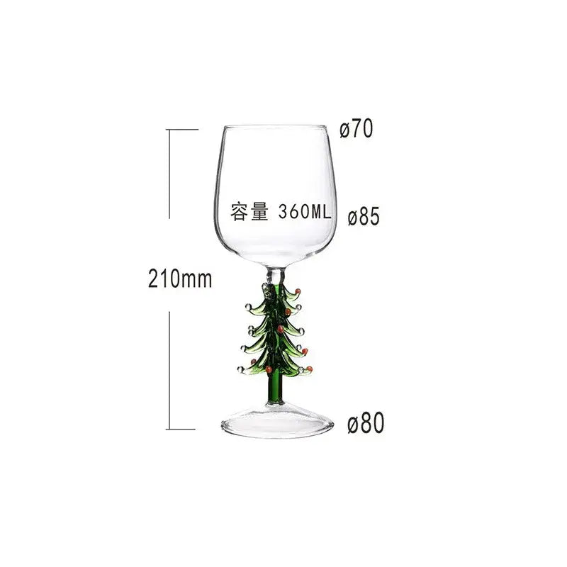 A clear glass 300ml 3d christmas tree wine glass with a festive green christmas tree stem and red ornaments
