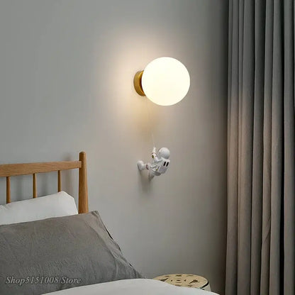 White astronaut moon wall lamp with frosted glass globe and gold-toned base for kids bedroom decorbites astronaut moon