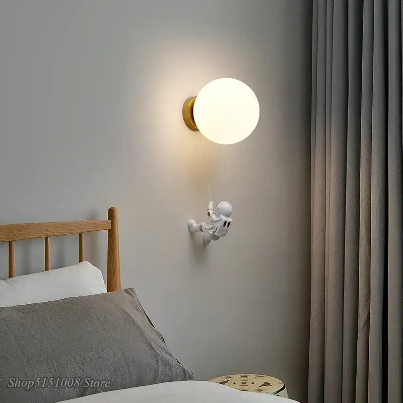 White astronaut moon wall lamp with frosted glass globe and gold-toned base for kids bedroom decorbites astronaut moon