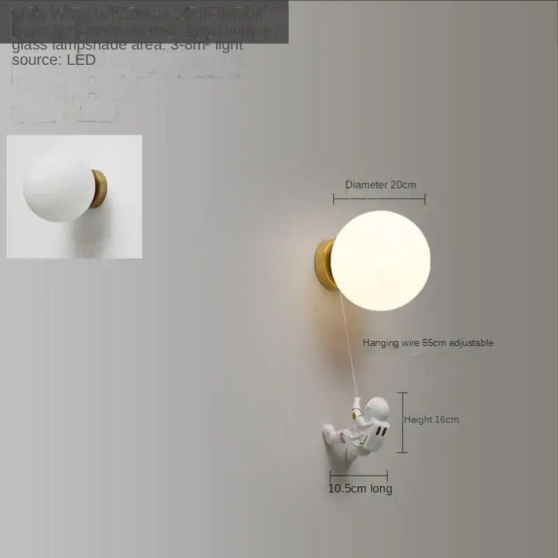 White spherical glass wall lamp with gold base featuring adjustable decorbites astronaut moon figurine for kids bedroom