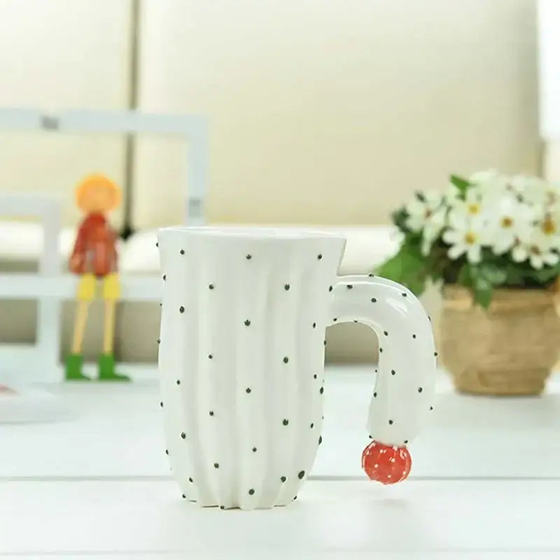White ceramic cactus style ceramic mug with black dots and red strawberry accent by decorbites 3d cactus design