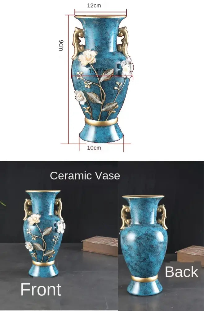 A blue ceramic vase with gold accents and white floral decorations for dried flowers and wobble plate display