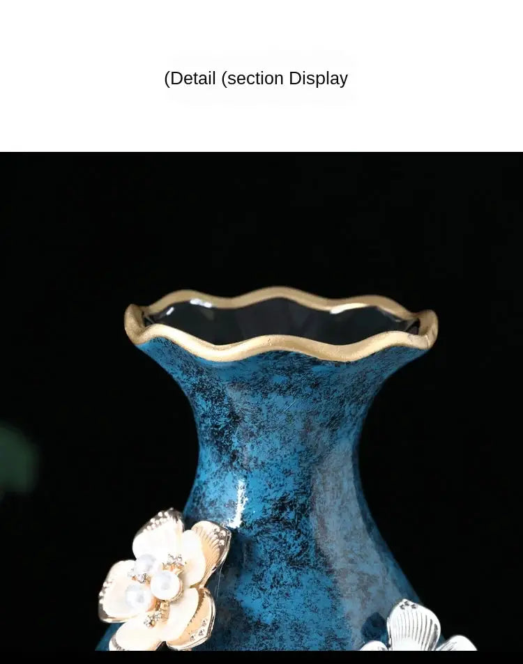 A blue ceramic vase with a gold-rimmed scalloped opening and pearl flowers for dried flowers or wobble plate decor
