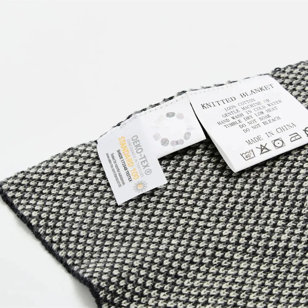 Black and white herringbone cube cotton knitted plaid blanket by decorbites for bedroom decor and throw use
