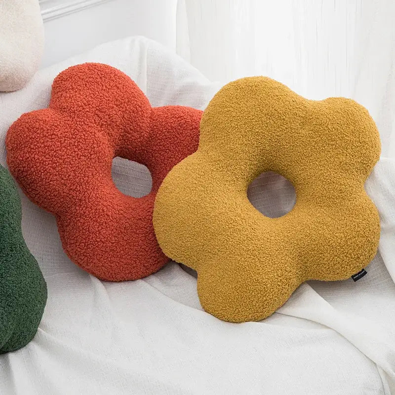 Soft plush flower decor nordic cushion in warm mustard yellow with fuzzy texture and central hole for living room use