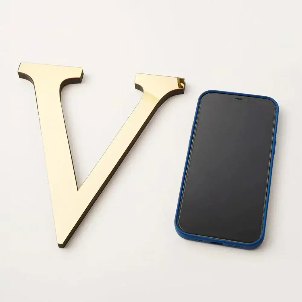 Gold-colored metallic 3d mirror letter v wall sticker by decorbites 20cm for modern living room decor
