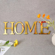 Gold mirrored 3d mirror letters wall stickers spelling home with sleek reflective finish decorbites 20cm gold decor