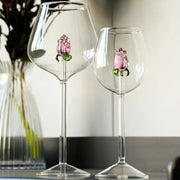 Clear glass wine goblets with 3d pink glass rose embellishments and green stems for decorbites 3d pink dining room drinkware set