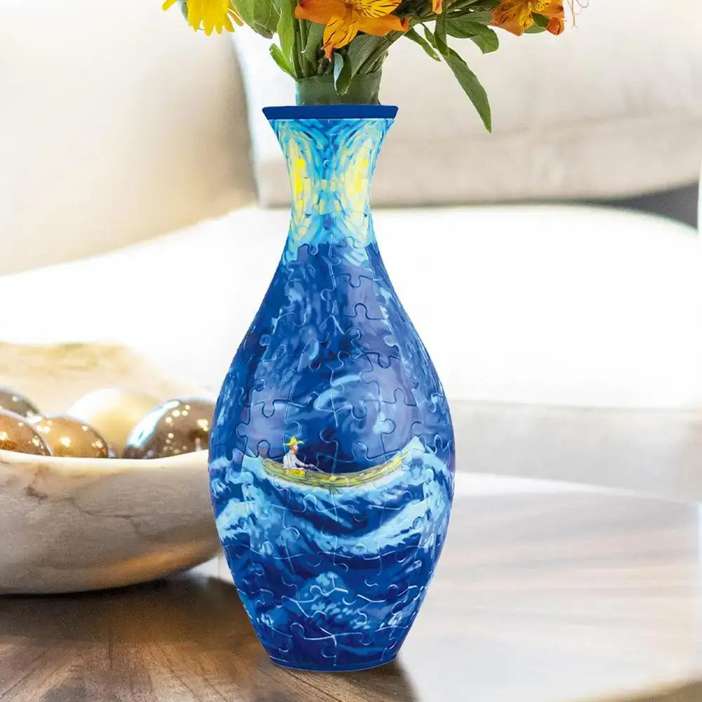 Blue curved puzzle vase building set featuring a swirling ocean scene and small boat inspired by van gogh starry night