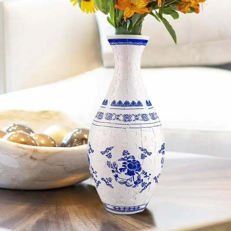 White and blue porcelain puzzle vase with intricate floral patterns in 3d puzzle vase building set curved puzzle design