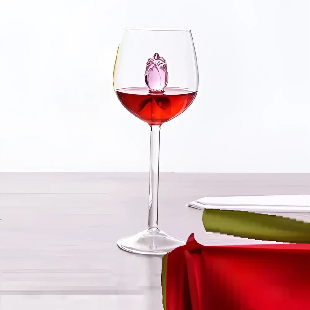 A clear glass rose champagne flute featuring a delicate pink crystal owl figurine inside by decorbites 3d rose