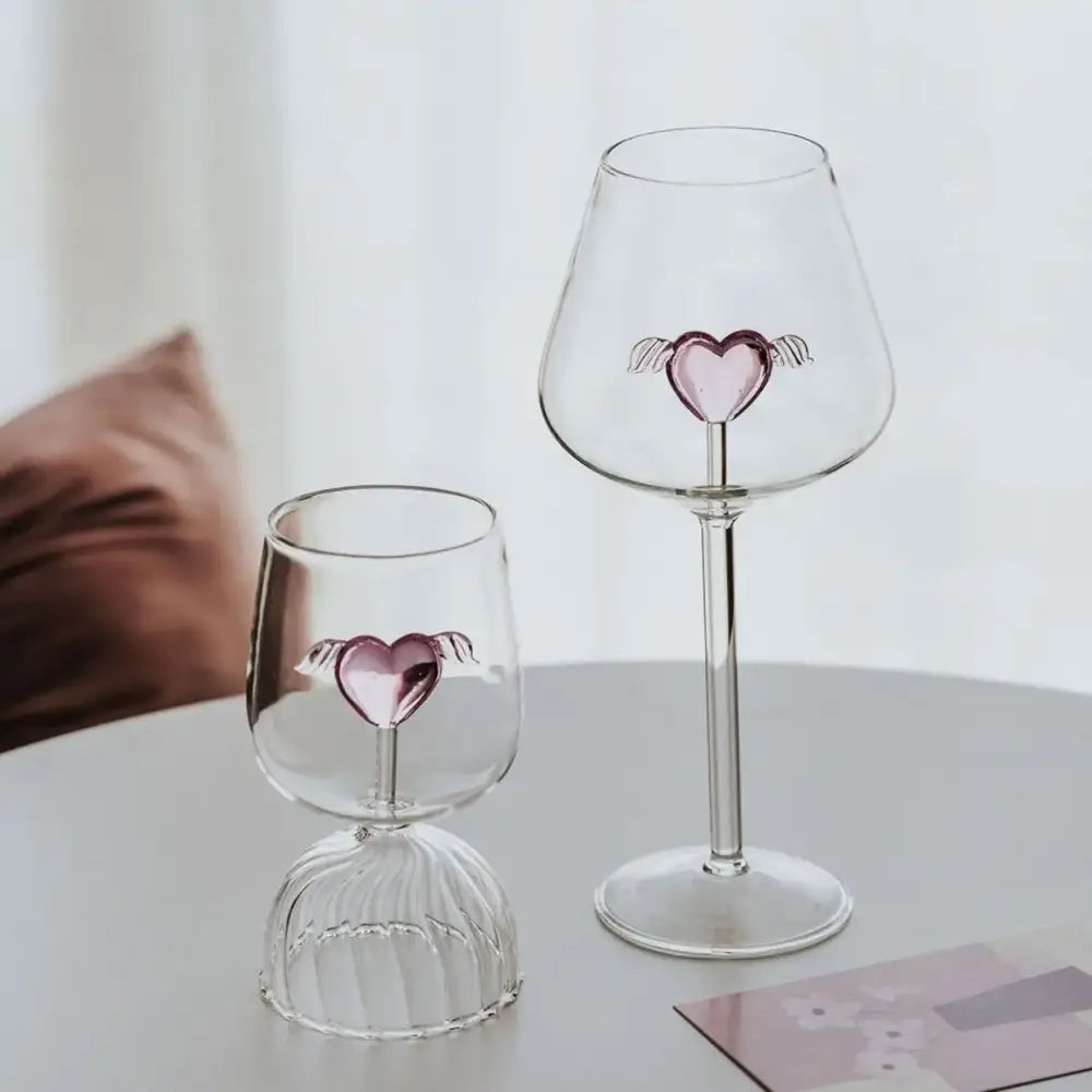 Clear glass rose champagne flute with delicate pink heart decals and tiny wings featuring decorbites 3d rose design