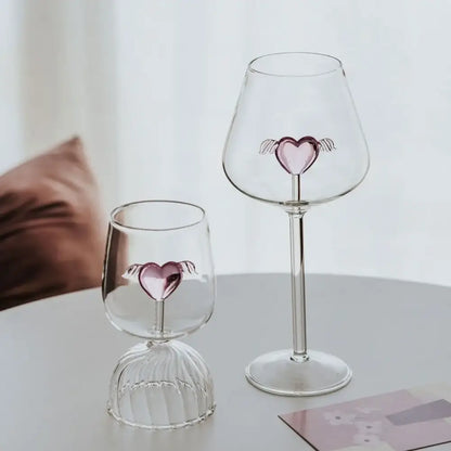 Clear glass rose champagne flute with delicate pink heart decals and tiny wings featuring decorbites 3d rose design
