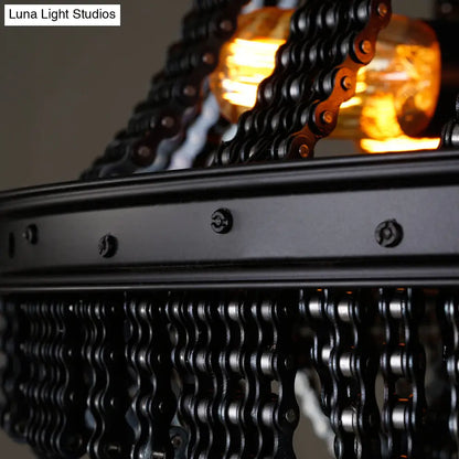 Lámpara colgante industrial de hierro negro con 4 luces