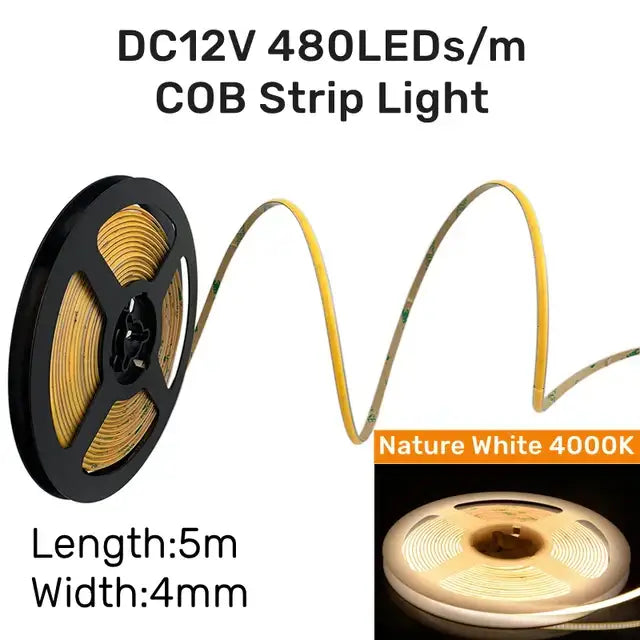 A flexible yellowish-white led strip light with 480 leds per meter on a black spool for led aluminum profile corner trim