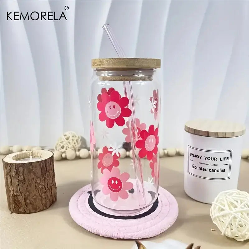 Clear glass tumbler with pink smiling flower decals and bamboo lid featuring integrated straw decorbites 470ml pink