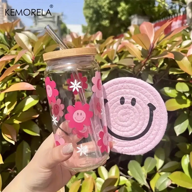 Clear glass tumbler with 470ml pink smiling flower decals, bamboo lid, and straw from decorbites kitchen glass collection