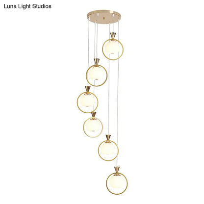 6-Light White Glass Stair Pendant with Gold Metal Loop - Ball Shaped Suspension Light