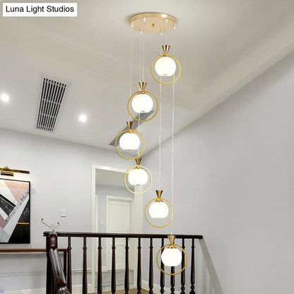 6-Light White Glass Stair Pendant with Gold Metal Loop - Ball Shaped Suspension Light