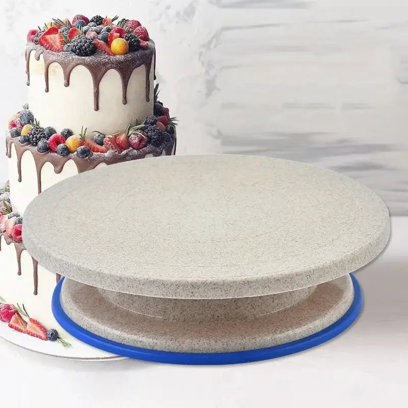 Gray speckled cake decorating turntable with blue base from decorbites 6-piece cake decorating turntable set kitchen stand