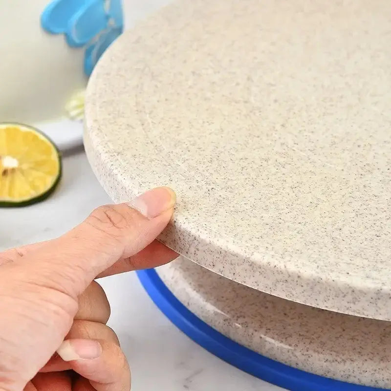 Beige speckled cake decorating turntable with a blue base from decorbites 6-piece kitchen stand set