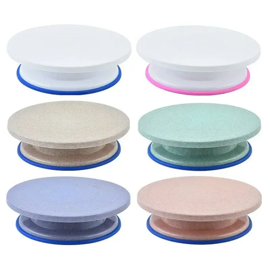 Six colorful round plastic cake decorating turntables with blue bases from the decorbites cake decorating set