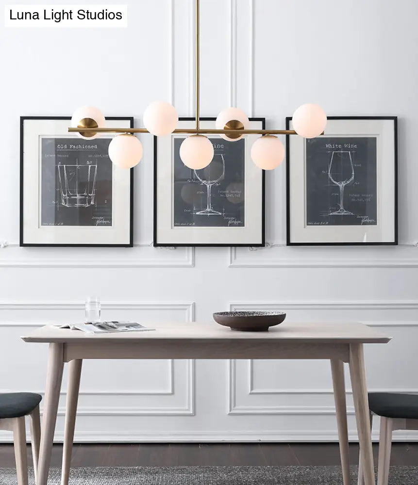 ديكوربايتس™ مصباح جزيرة معدني ذهبي حديث بسبعة مصابيح مع زجاج أبيض كروي - مثالي لطاولة الطعام