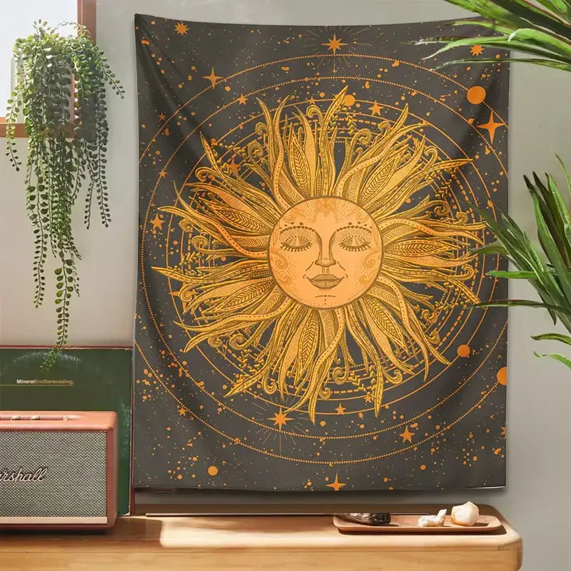 A 70s retro celestial sun moon wall tapestry featuring a golden feathered celestial sun on dark starry decorbites background