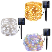Led solar string fairy lights in warm white clear white and multicolored with black solar panel stakes for outdoor use