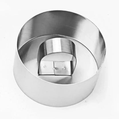 Shiny stainless steel round cake ring with hinged double-sided design from 9 piece stainless steel bakeware mold set
