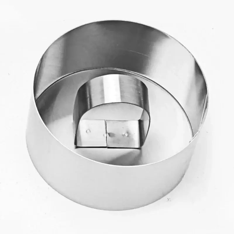 Shiny stainless steel round cake ring with hinged double-sided design from 9 piece stainless steel bakeware mold set