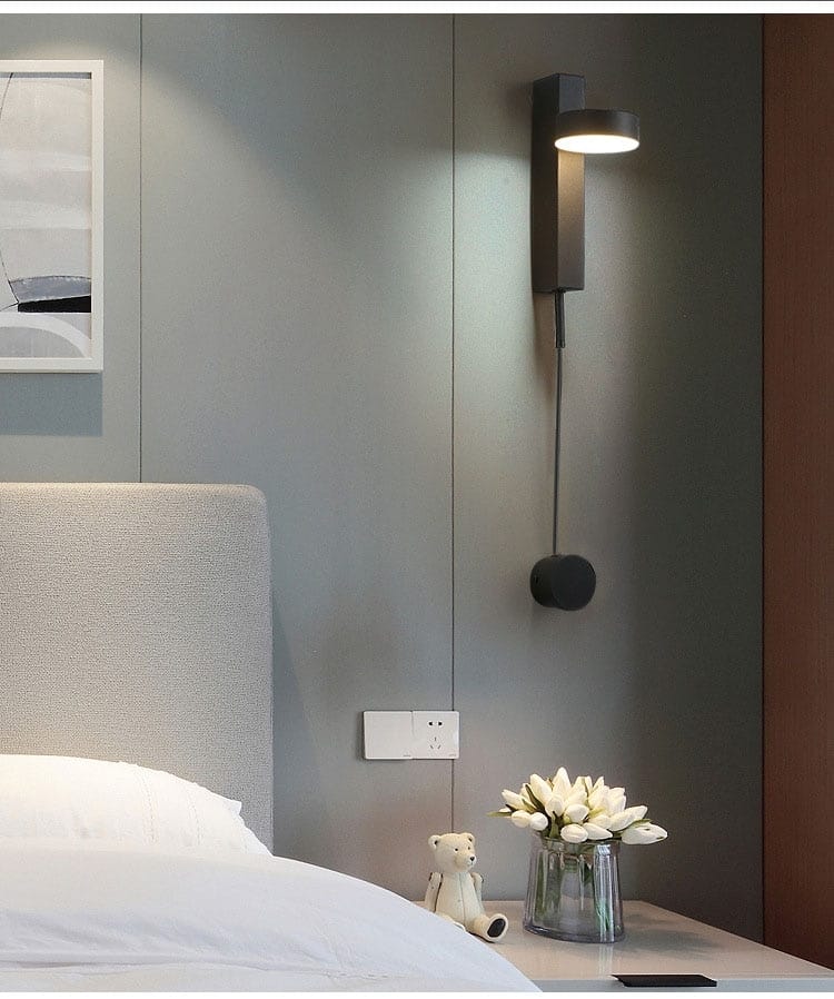 modern black wall lamps with a sleek minimalist design and adjustable arm, featuring a rotating sconce light ideal for bedroom use as modern led wall lamps.
