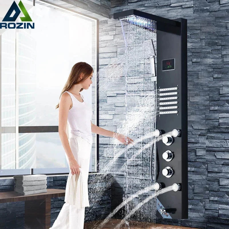 Grifo con panel de ducha y luz LED DecorBites™ con cabezal de ducha tipo cascada y chorros de masaje