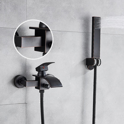 Grifo de ducha y bañera DecorBites™ de montaje en pared, color negro, con caño tipo cascada