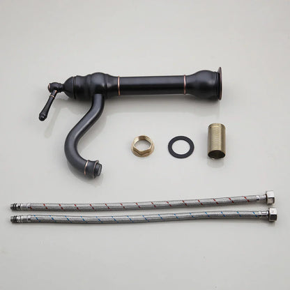 Lavabo DecorBites™ de cerámica negra con diseño de cascada pintado a mano y grifo de latón