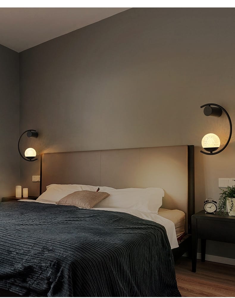 modern gold luxury creative led black curved wall sconces with spherical frosted glass shades for creative led bedside lighting in the bedroom led bedside wall lamp design