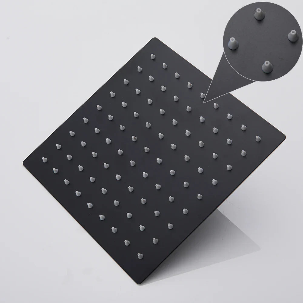 Juego de cabezal de ducha tipo lluvia ultrafino negro DecorBites™ con soporte de brazo, manguera y grifo.