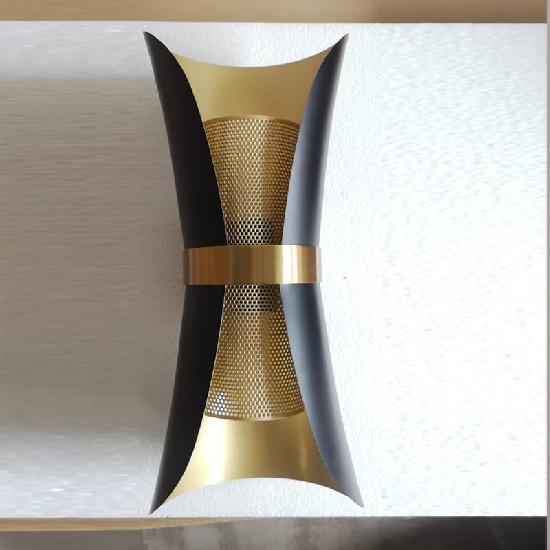 Modern black and gold curved wall lamp featuring a sleek metallic design ideal for bedroom lighting.