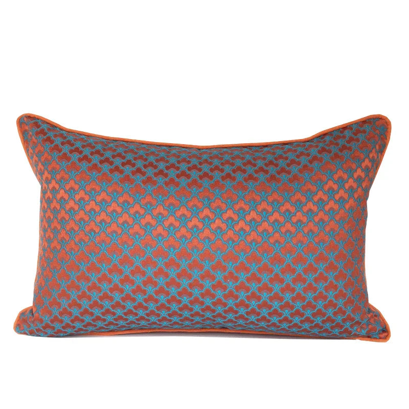 Funda de almohada lumbar DecorBites™ con jacquard geométrico azul y rojo para una decoración moderna de lujo.