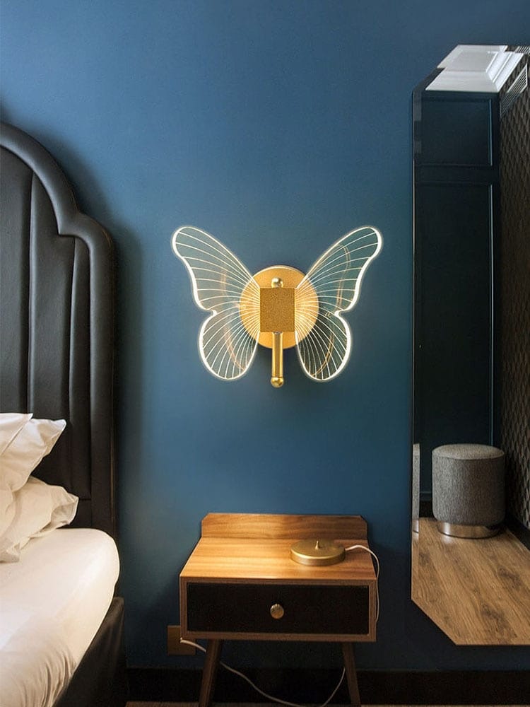 modern nordic gold led butterfly wall lamp featuring a copper led butterfly design with illuminated wireframe wings for bedroom use.
