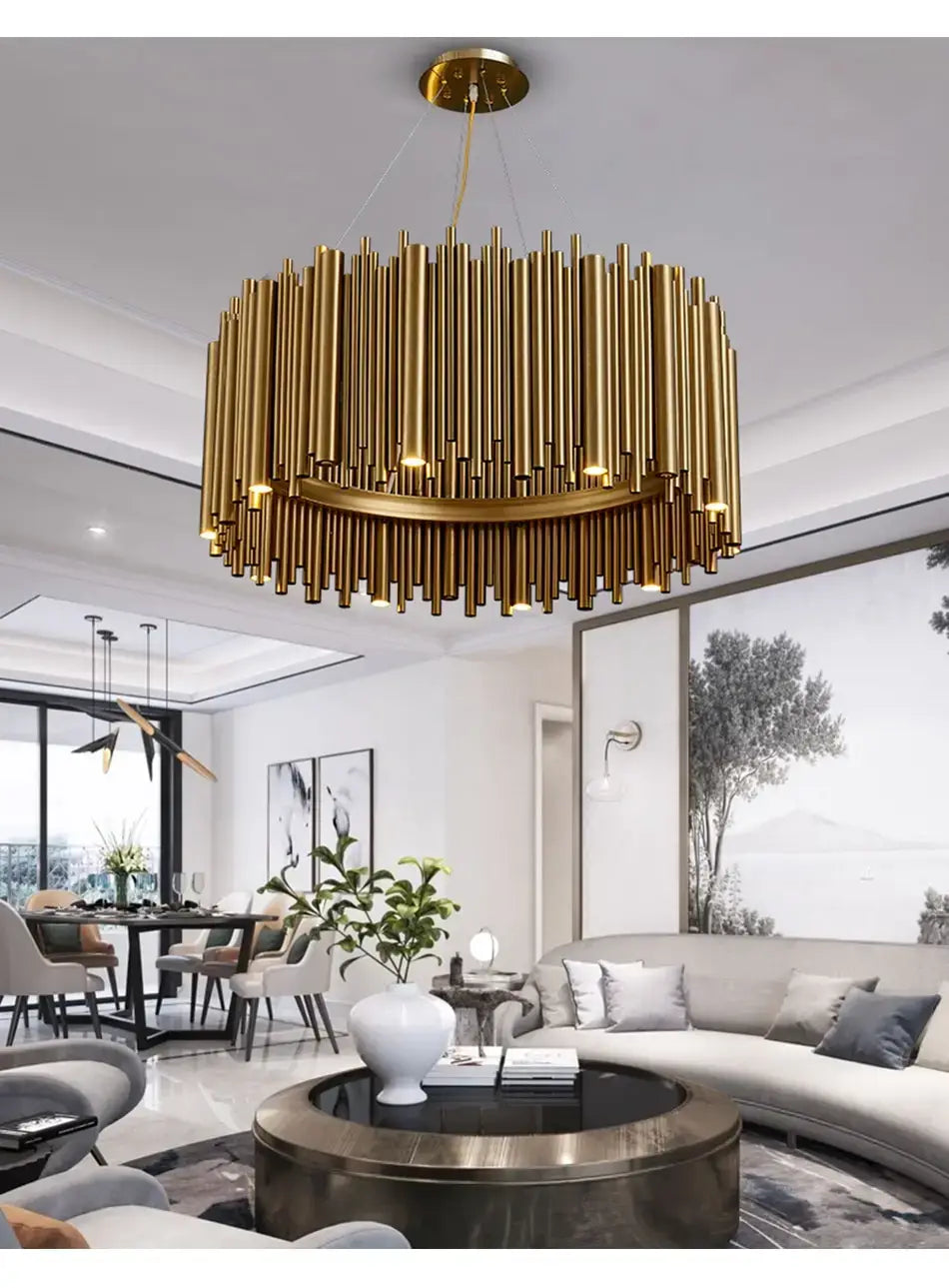 Luxury modern round gold chandelier with a golden cylindrical design and circular radial pendant light hanging from the ceiling in a living room.