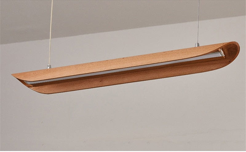 A sleek light-brown wood chandelier kitchen island light fixture with a smooth curved design and integrated led lighting for modern kitchens.