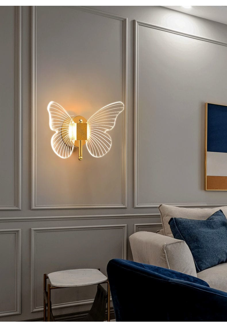 Modern nordic gold led butterfly wall lamp features a gold-toned copper led butterfly design with illuminated translucent wings ideal for bedroom decor.