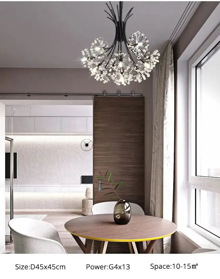 A modern black and clear crystal led flowers chandelier with a branching design hangs above the dining table in a dining room.